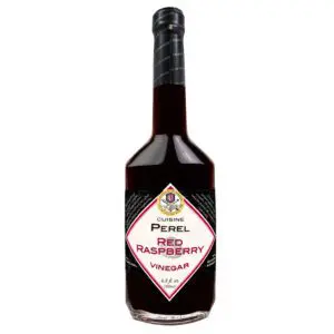 A bottle of red raspberry syrup.