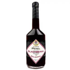 A bottle of alcohol with the name " perel blackberry ".